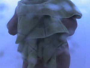 Tan lines form her bikini getting spied Picture 6