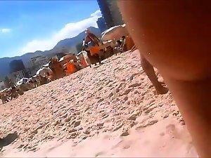 Firm young ass voyeured on a beach Picture 4