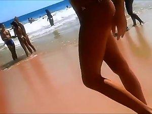 Firm young ass voyeured on a beach Picture 5