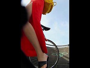 Red dress with a big cut shows a lot of upskirt Picture 3