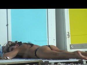 Peeping on hot topless milf on the beach Picture 8