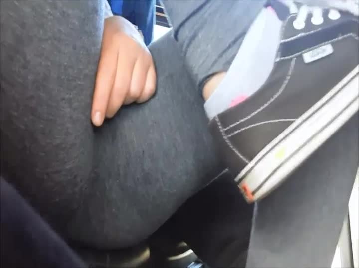 Hot girl rubs her pussy during a bus ride