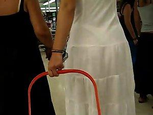 Thong peeks through her white dress Picture 7