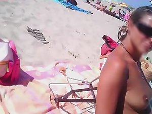 Naked girl plays in the shallow water Picture 4