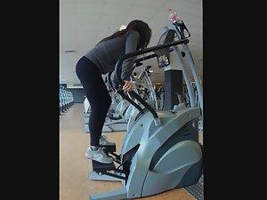 Motivated girl works out in gym Picture 7