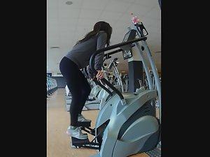 Motivated girl works out in gym Picture 8