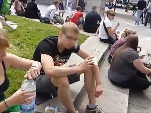 She sits on the curb and I spy her tits Picture 2