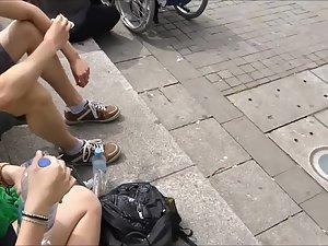 She sits on the curb and I spy her tits Picture 6