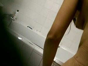 Sweet teen girl is spied in the shower Picture 2