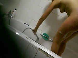 Sweet teen girl is spied in the shower Picture 7