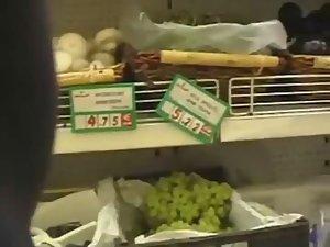 Pierced pussy seen as she bends over Picture 2