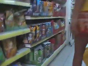 Pierced pussy seen as she bends over Picture 8