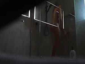 Spying on amazing blonde masturbating in shower Picture 7