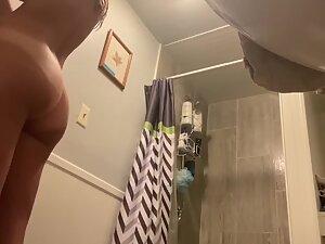 Hidden cam caught surprisingly big tits in bathroom Picture 8