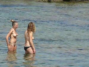 Peeping on three gorgeous teens in topless Picture 5