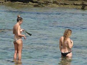 Peeping on three gorgeous teens in topless Picture 8