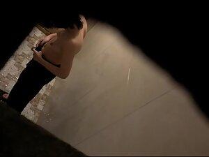 Peeping on petite asian girl undressing for shower Picture 3