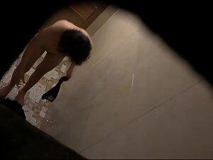 Peeping on petite asian girl undressing for shower Picture 5