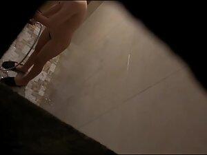 Peeping on petite asian girl undressing for shower Picture 7