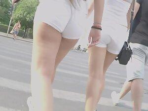 Plucking the shorts out of her phat ass crack Picture 1