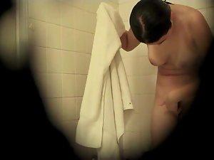 Peeping on her tits and a hairy bush Picture 6