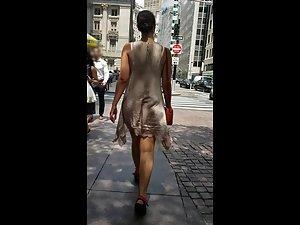 Naked ass visible when wind blows her dress up Picture 6