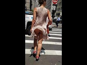 Naked ass visible when wind blows her dress up Picture 8
