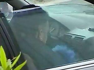 Punk girl caught giving blowjob in a car Picture 1