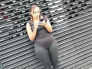 Checking out her big booty while she talks on phone