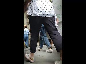 Upskirt shows whenever she doesn't pull the skirt down Picture 3