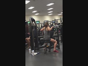 Hot girl perks her ass while exercising shoulders Picture 2