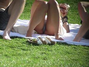 Showing panties in upskirt when she lies down Picture 4