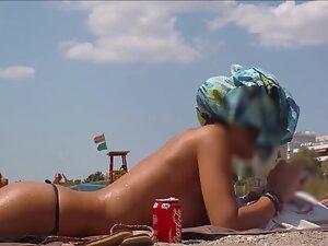 Waiting to see her fake pointy tits in topless Picture 3