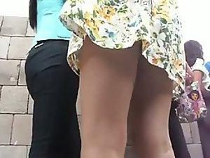 Windy weather reveals her little thong Picture 1