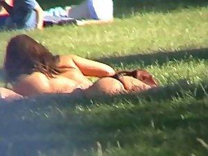 Girl friends tanning in the park Picture 1