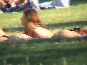 Girl friends tanning in the park Picture 7