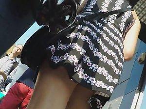 Young round butt in upskirt on street Picture 4