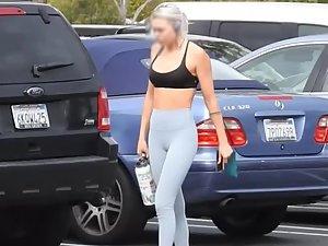Nonchalant sporty girl walking to the gym