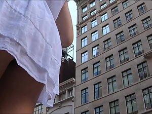 Upskirt shows her buttocks are tight and her pussy is shaved Picture 6