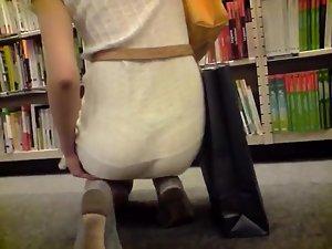 Thong peeking out in the library Picture 5