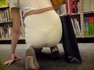 Thong peeking out in the library Picture 7