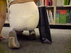 Thong peeking out in the library Picture 8