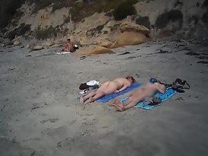 Two nudist friends recorded on scarce naked beach Picture 1
