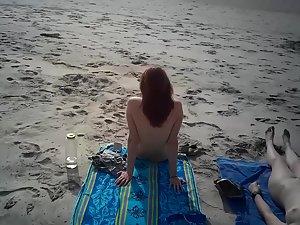 Two nudist friends recorded on scarce naked beach Picture 4