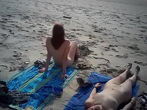 Two nudist friends recorded on scarce naked beach Picture 5