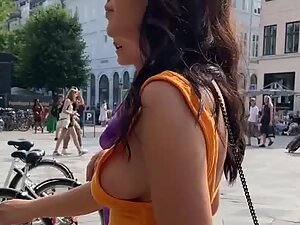 Sideboob peeks from elegant dress