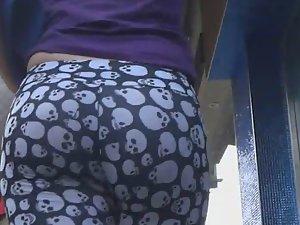 Sexy girl with skulls on her tights