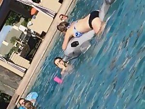 Hottie jumps on inflatable dolphin Picture 7