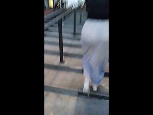 Big ass and sexy thong visible through long grey skirt Picture 1