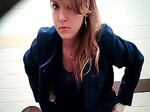 Beautiful teen girl caught by a toilet cam Picture 1